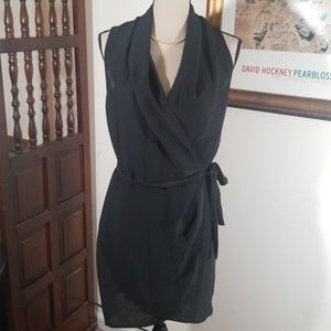 Fluxus wrapped black sleeveless dress. Size S
